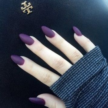 Dark, matte nail polish is a great way to incorporate colour inspiration into a look with a perfect amount of subtlety.